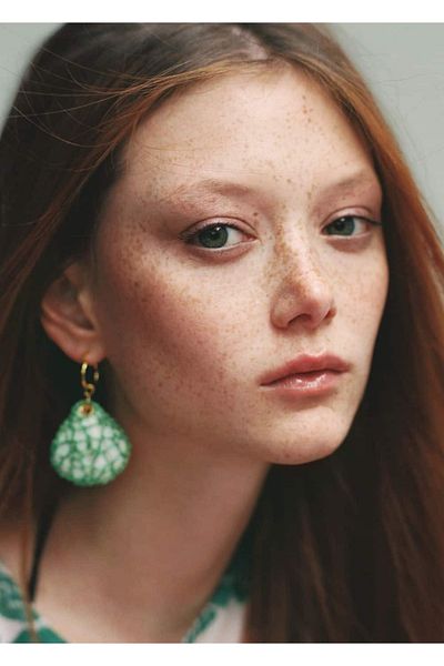 MANGO Woman Muschelohrringe