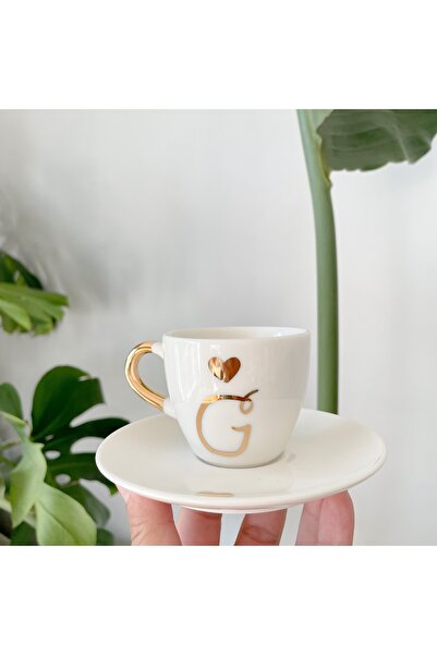 Mugtasarım كوب قهوة تركي من البورسلين المطلي بالذهب عيار 24 قيراط - حرف G