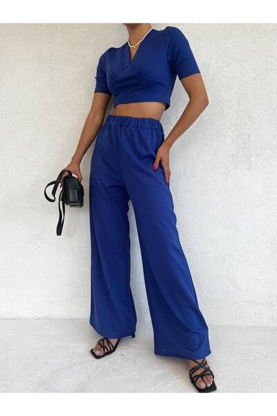 dükkan10butika طقم بلوزة علوية نسائية وبنطلون مريح باللون الأزرق