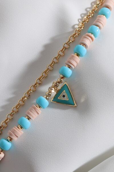 Süspüs Accessories سوار متدلي مثلث مطرز باللون الوردي من فيمو مكون من قطعتين