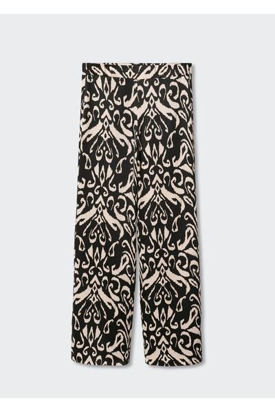 MANGO Woman Saténové kalhoty se vzorem