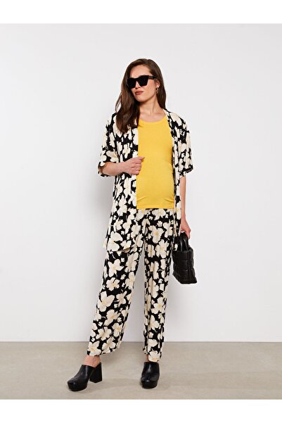 LC Waikiki Květinové těhotenské kalhoty s břišním panelem a elastickým pasem od Aymira Clothing