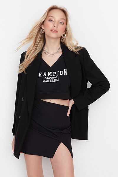 Trendyol Collection Czarna mini tkana spódnica z rozcięciami i szczegółowymi szczegółami TWOAW23ET00040