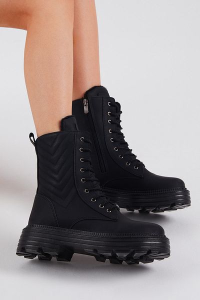 Tonny Black Bequeme Schnürstiefel für Damen mit schwarzem Hautmuster