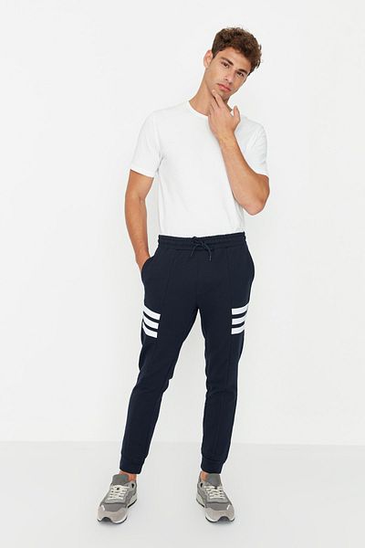 Trendyol Collection Navy Blue Regular Fit Sweatpants - Striped and Elastic Legs TMNAW23EA00146