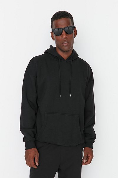 Trendyol Collection Schwarzes Fleece-Sweatshirt mit Blumendruck - Übergroße Kapuze TMNAW22sw1651