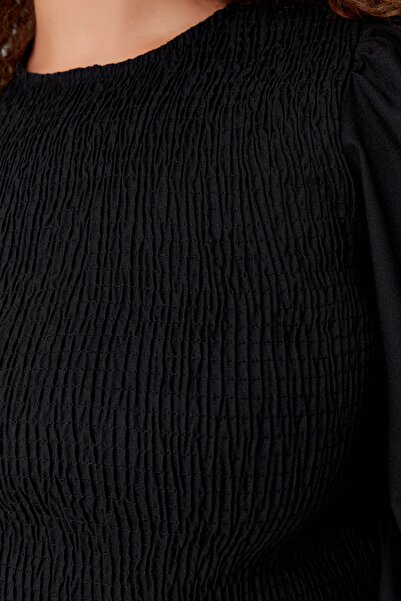 Trendyol Curve Čierna elastická blúzka s balónovým rukávom TBBAW23AF00108