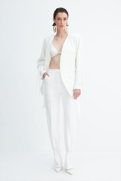 Trendyol Collection X Zeynep Tosun Ekru Paça Kravaty Detailed Kalhoty TPRAW23PL00031