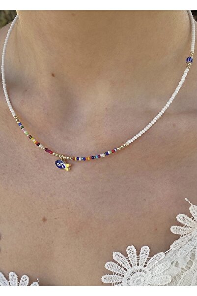 takıtarzım قلادة من الخرز الرملي الملون على شكل سمكة