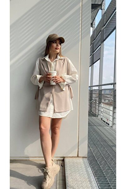 bymaestro woman Жіночий жилет з розрізом збоку та деталями з бежевого кольору