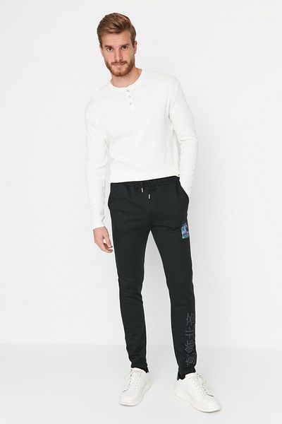 Trendyol Collection Black Men's Regular Fit Elastic Leg Art Licensed Sweatpants TMNAW23EA00007