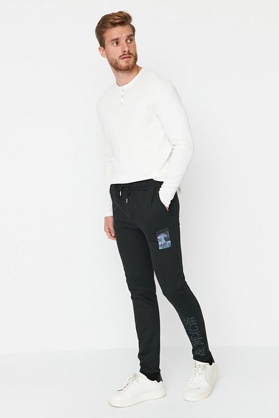 Trendyol Collection Black Men's Regular Fit Elastic Leg Art Licensed Sweatpants TMNAW23EA00007