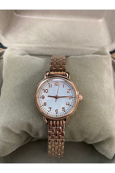 Spectrum Numeral Women's Clock