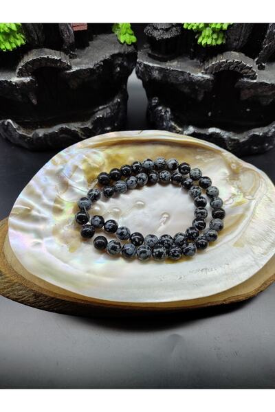 DOĞAL TAŞ DELİSİ Sequență de piatră naturală de obsidian încărcat de zăpadă (...