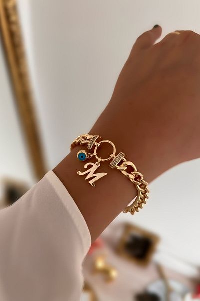 Trendy Butik سوار من حجر الزركون على شكل حرف M وسلسلة متدلية على شكل عين الشر
