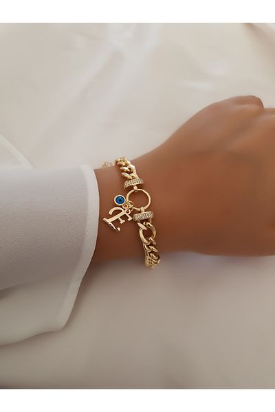 Trendy Butik سوار من حجر الزركون على شكل حرف E وسلسلة متدلية على شكل عين الشر