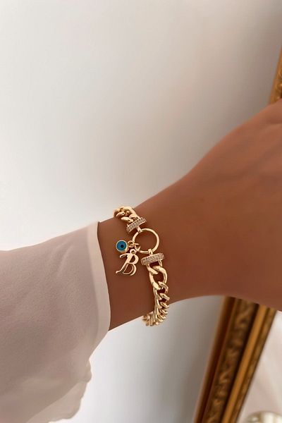 Trendy Butik سوار دائري من حجر الزركون موديل حرف B وعين الشر متدلية