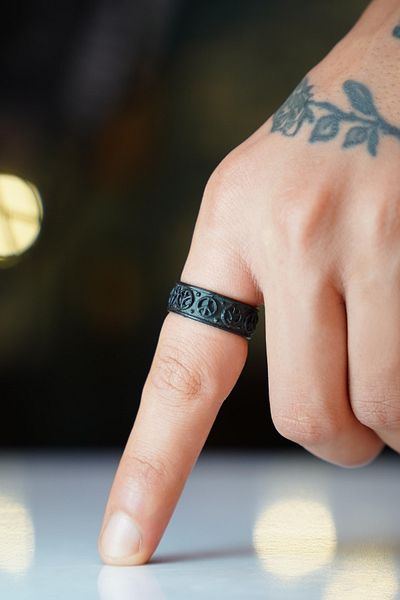 The Collection Adjustable Black Ring with Freedom Chain Figure