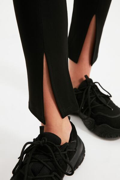 Trendyol Collection Colanți negri tricotate cu talie înaltă, cu detaliu cu fante în față TWOAW22TA0004