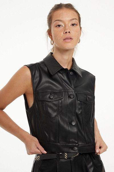 its basic Women's Black Leather Color Buttoned Front Faux Leather Vest