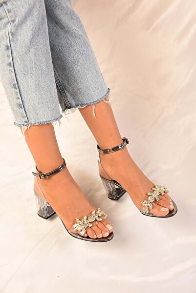 Shoeberry Women's Maggie Platinum Transparent Stone Heeled Single Strap Shoes