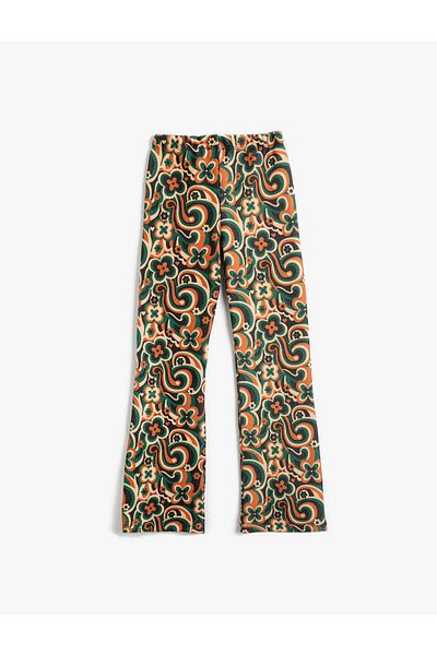 Koton Geblümte Hose mit ausgestelltem Bein und Schlitzdetail