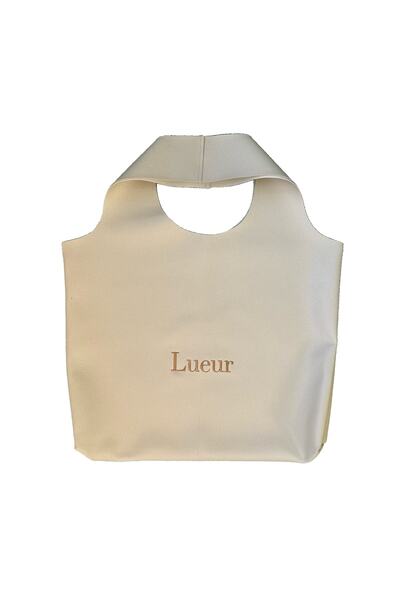 Pretty Little Petra حقيبة كريم لور