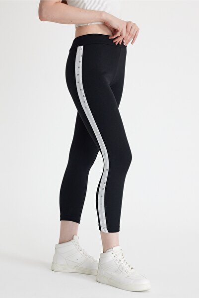 gozdefashion لباس ضيق نسائي بتفاصيل مخططة باللون الأسود