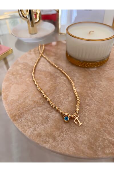 Trendy Butik قلادة دوريكا مع حرف T وتفاصيل عين الشر