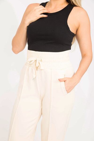 Şans Women's Beige Lycra Scuba Fabric Trousers with Wide Elastic Waist and Iron Mark Sewing Detail 65n35275