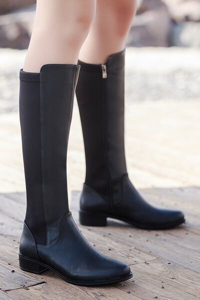 serhatlar حذاء كاجوال طويل من الجلد الأسود للنساء مع تفاصيل مطاطية على الجانب