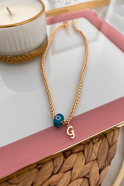 Trendy Butik Knitted Chain Necklace with Letter g and Evil Eye Hanging