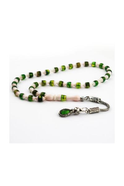 PİGADO Πράσινη κρυστάλλινη πέτρα με φούντες μαρμαρούνι κομμένο σε κορδόνια βε...