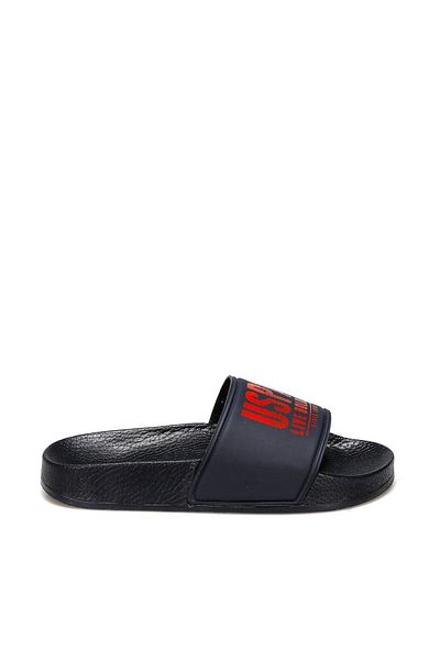U.S. Polo Assn. حذاء بحري للأولاد باللون الأزرق الداكن من GUSTY100509996