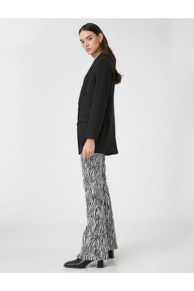 Koton Hose mit ausgestelltem Bein und Zebramuster und hoher Taille