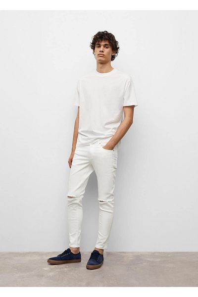 Mango Teen Завужені джинси з рваною деталлю