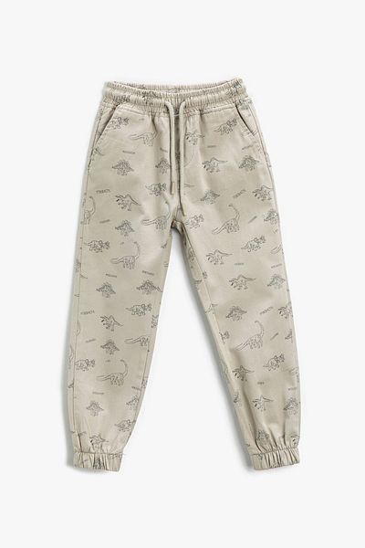 Koton Jungen-Jogginghose mit gebundener Taille und Tasche mit Dinosaurier-Muster 3skb40021tw
