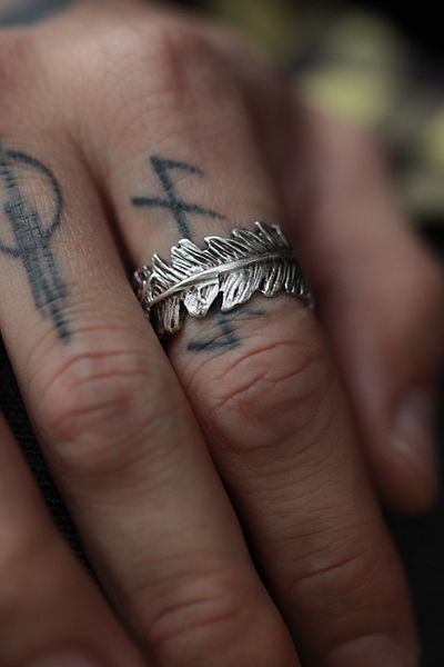 CAPO by Aytaç Yamaç Finger-Wrapping Feather Ring Has Adjustable Size