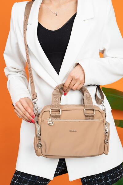 YOGII حقيبة يد وكتف أصلية مقاومة للماء من قماش المظلة موديل تشيستر Vip