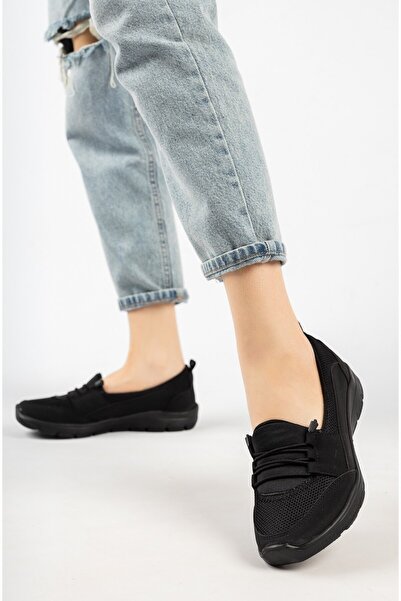 Ayşem Ayakkabı Çanta أحذية عايشيم السوداء لتقويم العظام