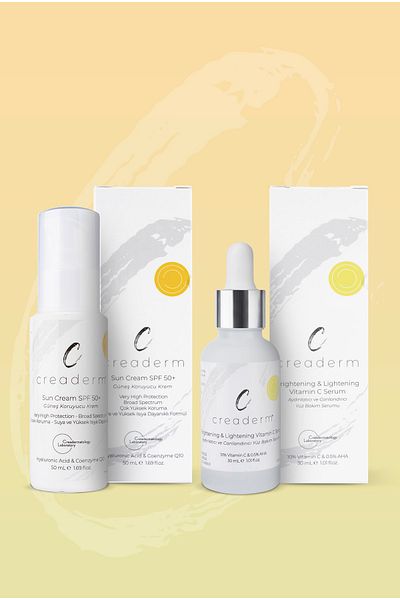 CREADERM كريم SPF 50 الواقي من الشمس - مجموعة فيتامين C المضيئة والمنشطة