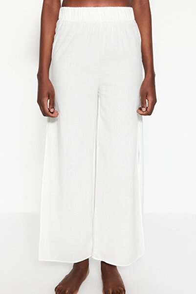 Trendyol Collection Ecru tkané plážové kalhoty ze 100% bavlny TBESS21PL0493