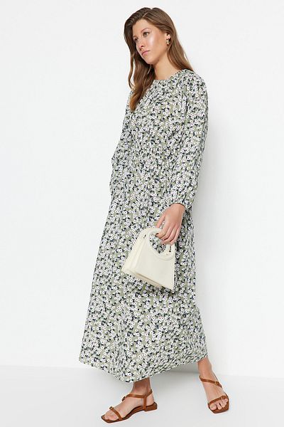Trendyol Modest Hellgrünes Kleid aus gewebter Baumwolle mit Blumenmuster und Gipe-Details TCTSS23EB00300