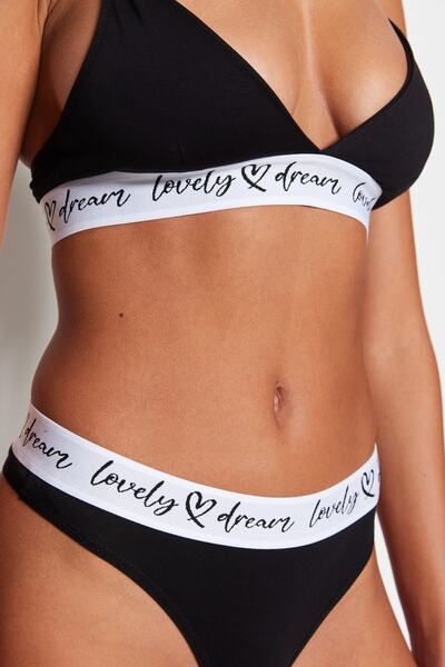 Trendyol Collection Schwarzes Dessous-Set aus Baumwollstrick mit String-Trägern - THMSS23CC00102