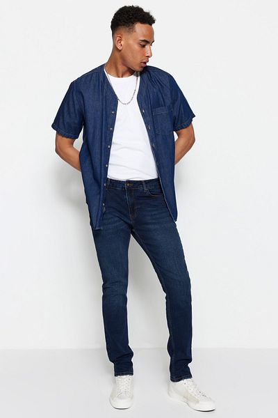 Trendyol Collection Marineblaue Slim-Fit-Jeans mit schmaler Passform und Stretch-Stoff TMNAW23JE00009