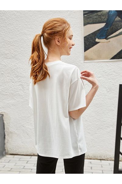 Machetta Tricou alb supradimensionat pentru fete cu litere verde pentru copii