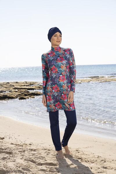 Estiva Γυναικείο μαγιό με φλοράλ σχέδιο σε μπλε ναυτικό χρώμα με παντελόνι