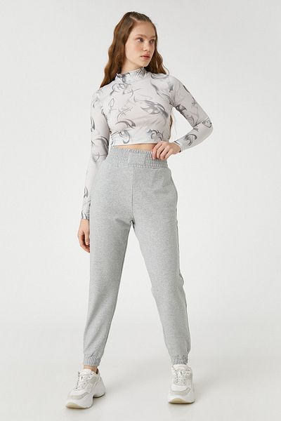 Koton Graue Melange-Jogginghose für Damen 3SAL40018IK