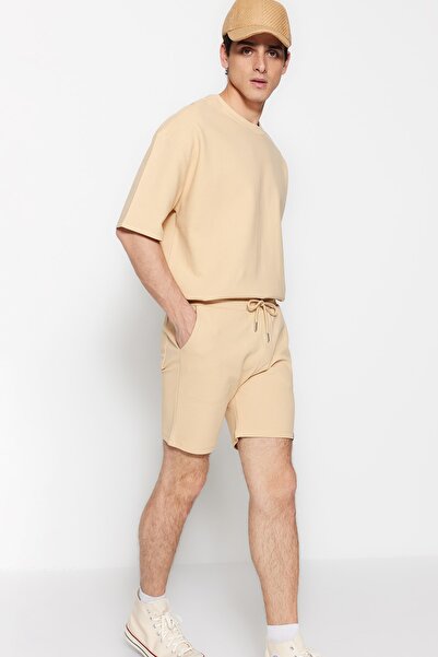 Trendyol Collection Béžové Regular Premium 100% bavlněné texturované šortky s detailem štítku - TMNSS23SR00032