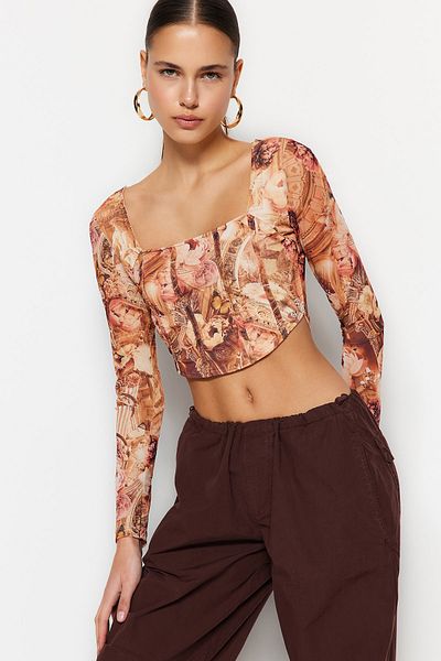 Trendyol Collection Hochwertige, orangefarbene, transparente, bedruckte, gefütterte, dehnbare Strickbluse aus bauchfreiem Tüll TWOSS23BZ00395